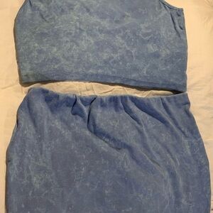 PrettyLittleThing Light Blue Ribbed Top and mini skirt set.